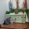 Cleaning the main alter at Holy Trinity Catholic Church in Corn Hill, TX
